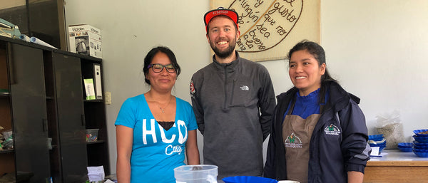 Charlie Gundlach with two other roasters taste testing coffee