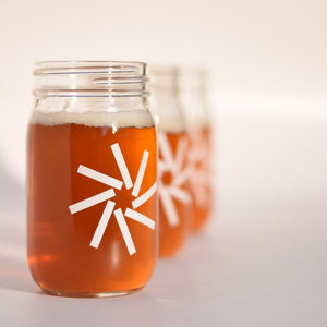 color coffee glass mason jar with white icon logo