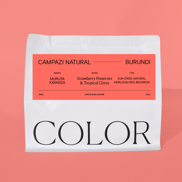 Color Coffee bag with 'Campazi Natural Burundi' label on a pink background
