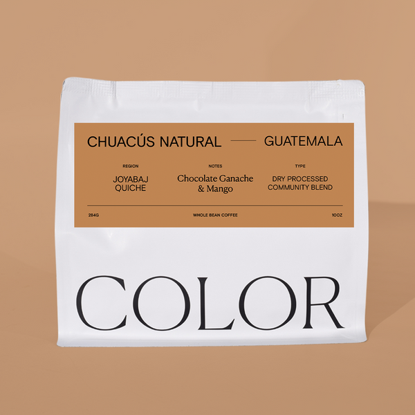 white 10oz whole bean Guatemalan coffee bag with brown label on a brown background