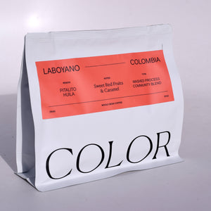 our 10oz white bag with dark pink coffee label and COLOR logo