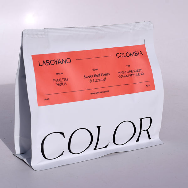 our 10oz white bag with dark pink coffee label and COLOR logo