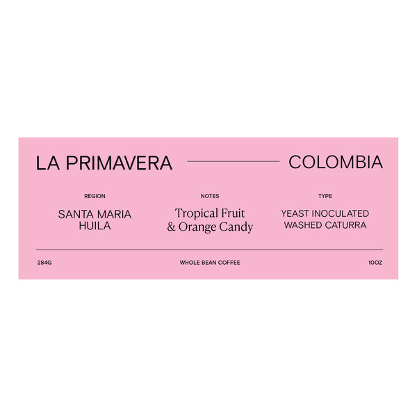 Colombia La Primavera coffee label pink with whole bean coffee details
