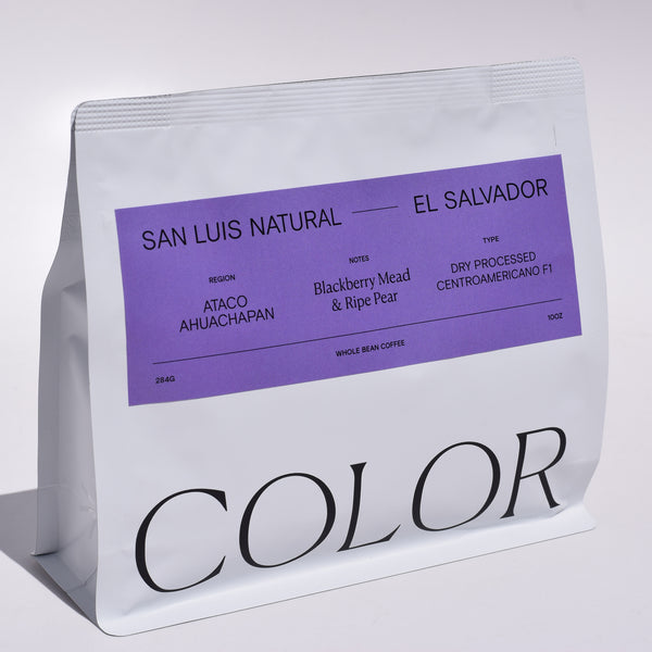 our white 10oz whole bean coffee bag with purple label