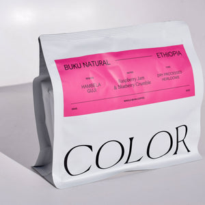 color coffee 10oz white whole bean coffee bag with pink label and Color logo