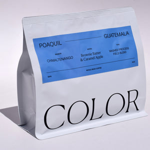 our white 10oz whole bean coffee bag with blue rectangular label Guatemala Poaquil