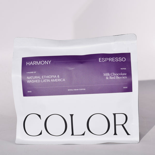 Color Coffee white 10oz whole bean coffee bag with purple label for Harmony Espresso