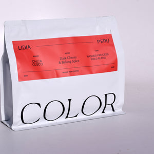 our 10oz white whole bean coffee bag with rectangle red label and COLOR logo