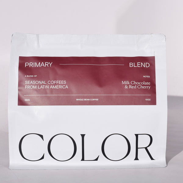 Color Coffee white 10oz whole bean bag with burgund label for Primary Blend