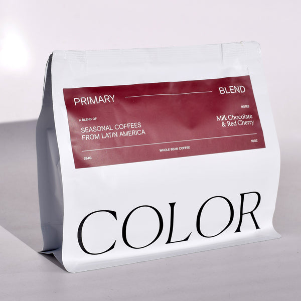 Color Coffee white 10oz whole bean bag with burgund label for Primary Blend