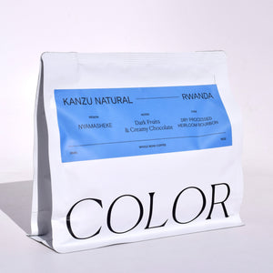 our white 10oz whole bean coffee bag with blue rectangle label for Rwanda Kanzu coffee details