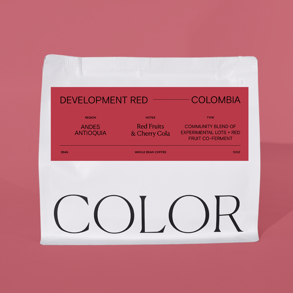 Coffee bag with red label and 'Color' branding on a pink background