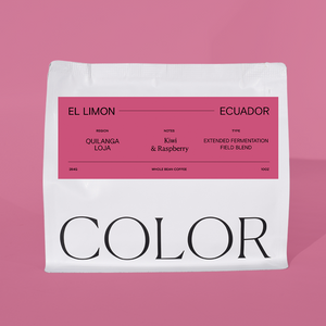 white 10oz whole bean coffee bag with magenta label and COLOR coffee logo on a magenta background