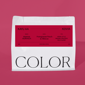 10oz white whole bean coffee bag with burgundy label and COLOR logo at the bottom on a burgundy background