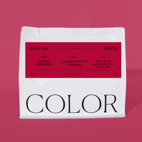 10oz white whole bean coffee bag with burgundy label and COLOR logo at the bottom on a burgundy background
