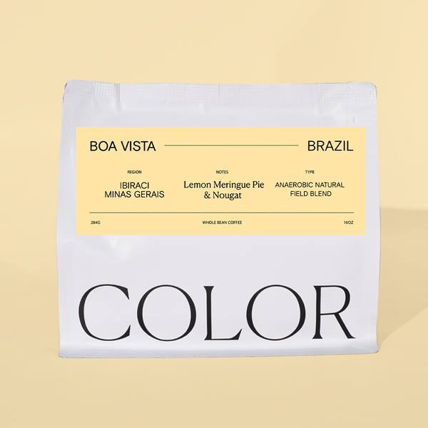 our white 10oz whole bean coffee bag with yellow label and COLOR logo at the bottom on a yellow background