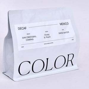 our newest decaf coffee from mexico, whole bean coffee in our new 10oz white coffee bag with white label