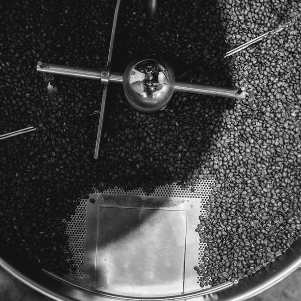 close up of color coffee roasting machine